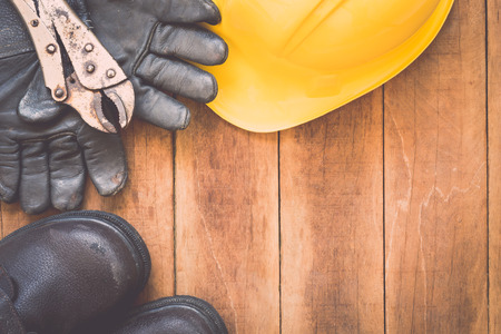 Close up of assorted work tools on wooden backgroundの写真素材