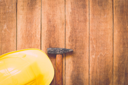 Close up of assorted work tools on wooden backgroundの写真素材