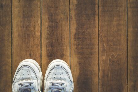 White old shoe on wood backgroundの写真素材