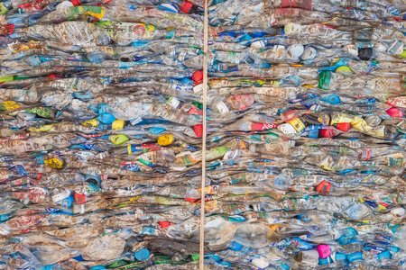 PHUKET, THAILAND - MARCH 3 : Crushed plastic bottles at a recycling facility in Phuket on March 3, 2015. The bottles will be shipped to a plastic foundry.のeditorial素材