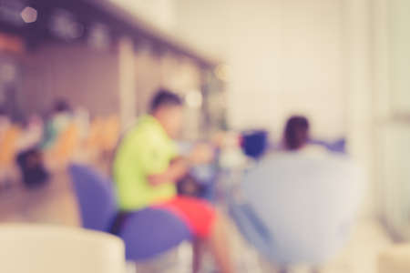 Blurred background : Customer sitting in car service station, vintage colorの写真素材