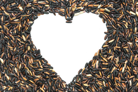 Close up black sticky rice isolated on white backgroundの写真素材