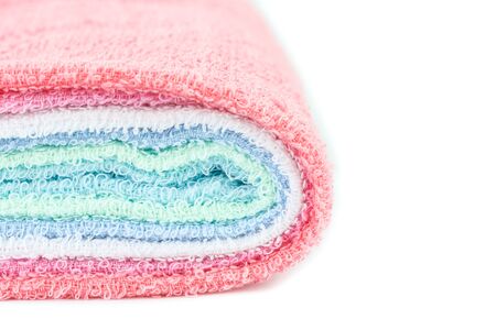Close up color towel isolated on white backgroundの写真素材