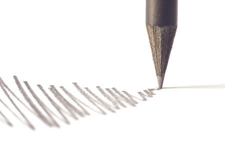 Close up Black pencil with stroke isolated on white backgroundの写真素材
