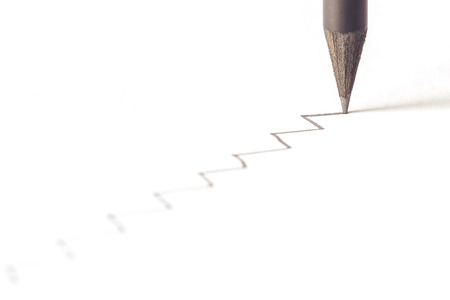 Close up Black pencil with stroke isolated on white backgroundの写真素材