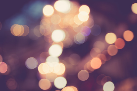 Blurred image of light defocus in shopping mall with bokeh, vintage colorの写真素材