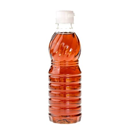 Thai fish sauce in a bottle isolated on white backgroundの写真素材