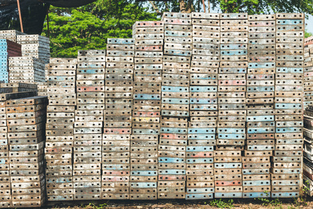 Stack of metal platform use for scaffolding in construction site