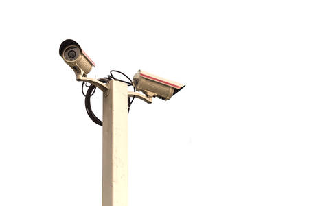 Close up Security CCTV camera isolated on white backgroundの写真素材