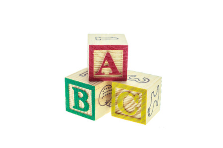 Close up ABC colorful alphabet blocks isolated on white background