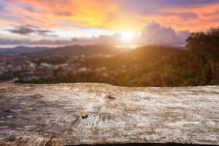 Close up old wood table top with sunlight and blur backgroundの写真素材