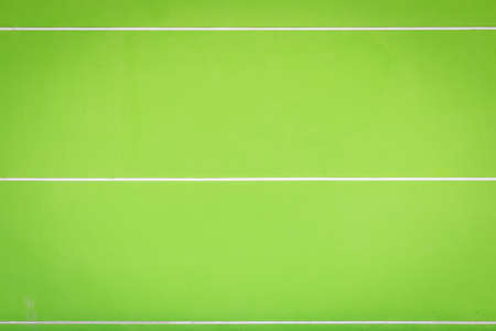 Abstract bright green cement wall with white stripe texture and backgroundの写真素材