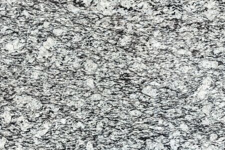 Pattern of black granite stone texture for background