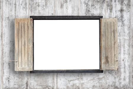 Old wooden windows frame on cement wall with empty space in the middleの写真素材