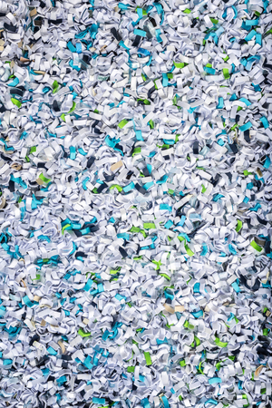 Pattern of waste paper from Binding Machines use as backgroundの写真素材