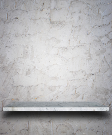 Empty top of natural stone shelves and stone wall background. For product displayの写真素材