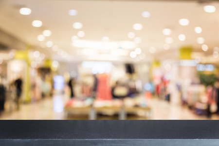 Empty top of natural stone table and blur with bokeh background. For product displayの写真素材