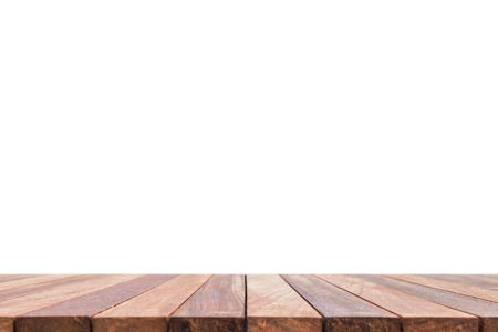 Empty top of wooden table or counter isolated on white background. For product displayの写真素材