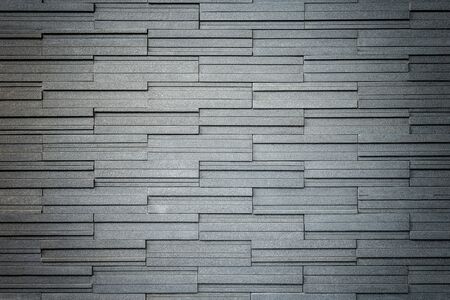 Pattern of grey and rough granite wall texture and backgroundの写真素材
