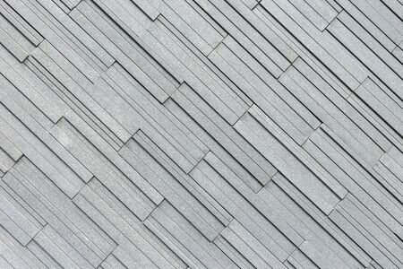Pattern of grey and rough granite wall texture and backgroundの写真素材
