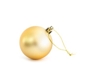 Gold Christmas ball isolated on white backgroundの写真素材