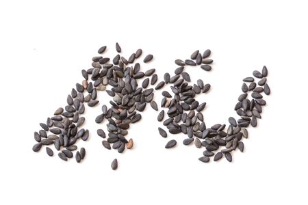 Macro black sesame isolated on white backgroundの写真素材