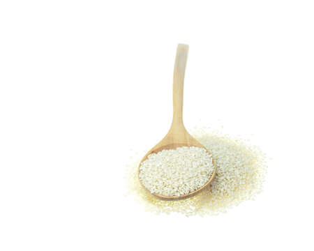 Close up white sesame isolated on white backgroundの写真素材