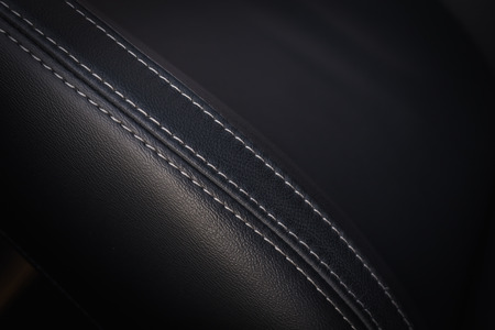 Detail of new modern car interior, Focus on seat leather texture