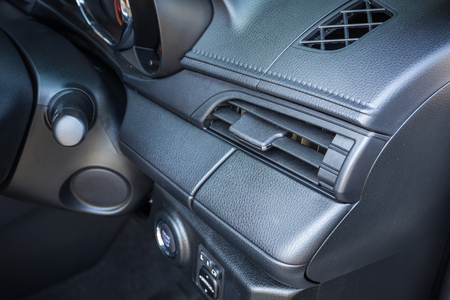 Detail of new modern car interior, Focus on door air-conの写真素材