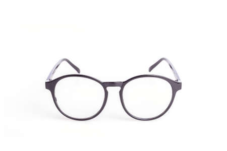 Close up black eye glasses isolated on white backgroundの写真素材