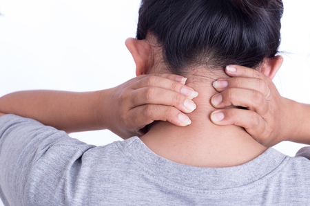 Woman's hand on her neck isolated on white background : Medical conceptの写真素材