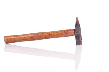 Close up old rusty hammer isolated on white backgroundの写真素材