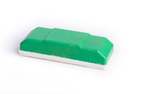 New green eraser isolated on white backgroundの写真素材
