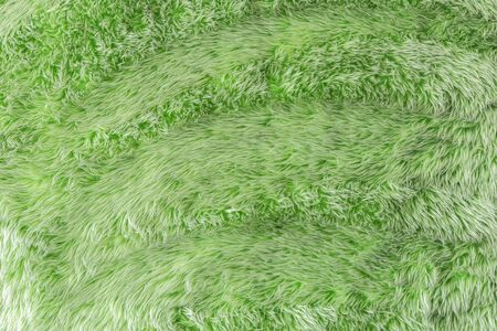 Abstract green wool textile texture and background
