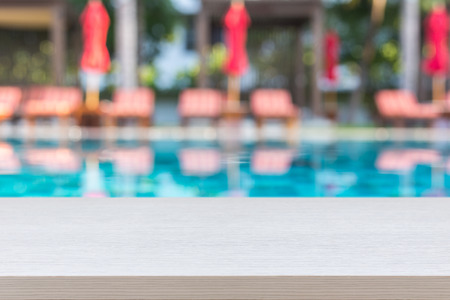 Empty top wooden table and abstract blurred and bokeh backgroundの写真素材