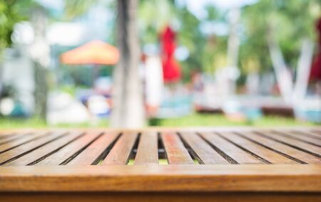 Empty top wooden table and abstract blurred and bokeh backgroundの写真素材
