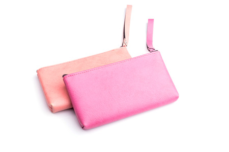 Close up color womens leather purse isolated on white background