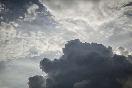 Dark storm clouds before rain over skyの写真素材