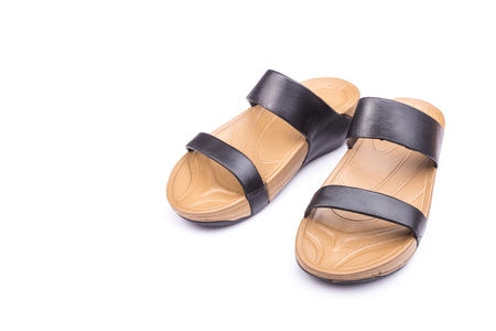 New brown sandalsshoes for lady isolated on white backgroundの写真素材