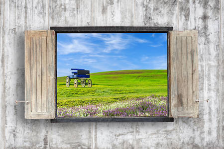 Old wooden windows frame on cement wall and view of tropical seaの写真素材