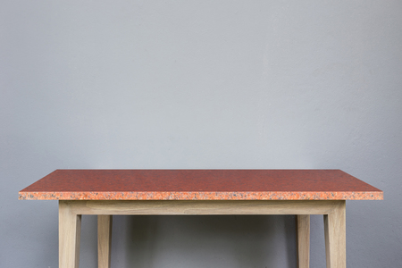 Empty top of natural stone table and grey wall background. For product displayの写真素材