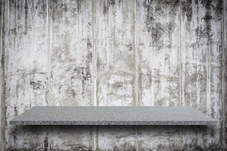 Empty top of natural stone shelves and stone wall background. For product displayの写真素材