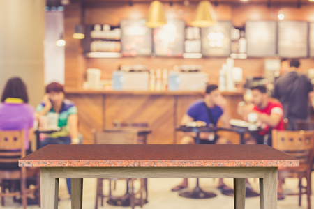 Empty top of natural stone table and blur with bokeh background. For product displayの写真素材