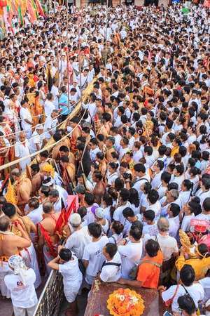 PHUKET, THAILAND - SEPTEMBER 30 : An unidentified people a perform a ceremony set the sacred wood poles is the symbol of the beginning Phuket Vegetarian Festival in Phuket on September 30, 2016.のeditorial素材