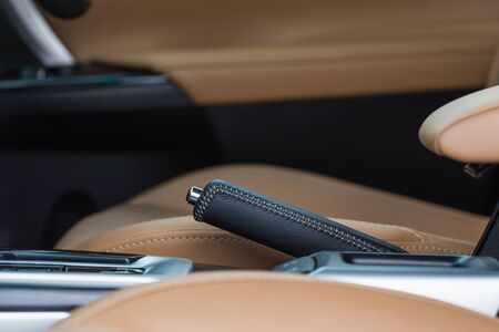 Detail of new modern car interior, Focus on hand breakの写真素材