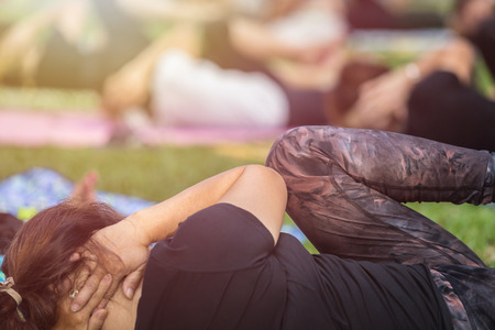 Group of asian woman doing yoga or exercise in the park
