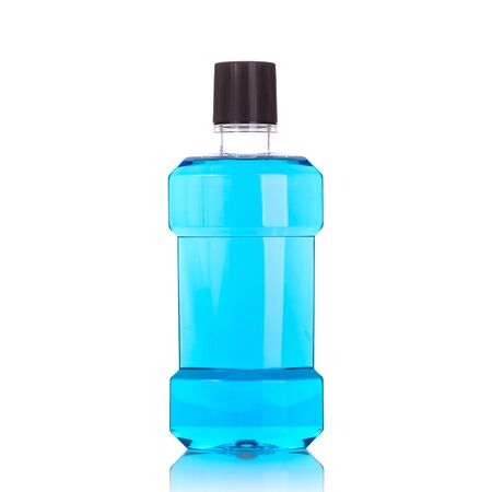 Bottle of blue mouthwashes. Studio shot isolated on white backgroundの写真素材