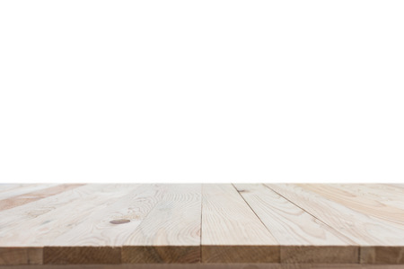 Empty top of wooden table or counter isolated on white background. Saved with clipping pathの写真素材