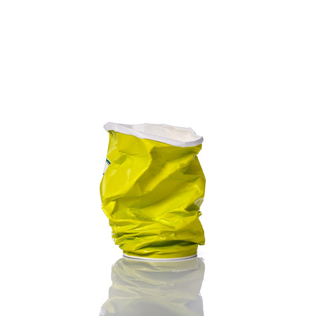 Blank green paper cup for soft drink or coffee. Studio shot isolated on white backgroundの写真素材