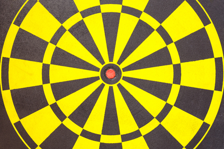 Texture of yellow and black dart board. For background usedの写真素材
